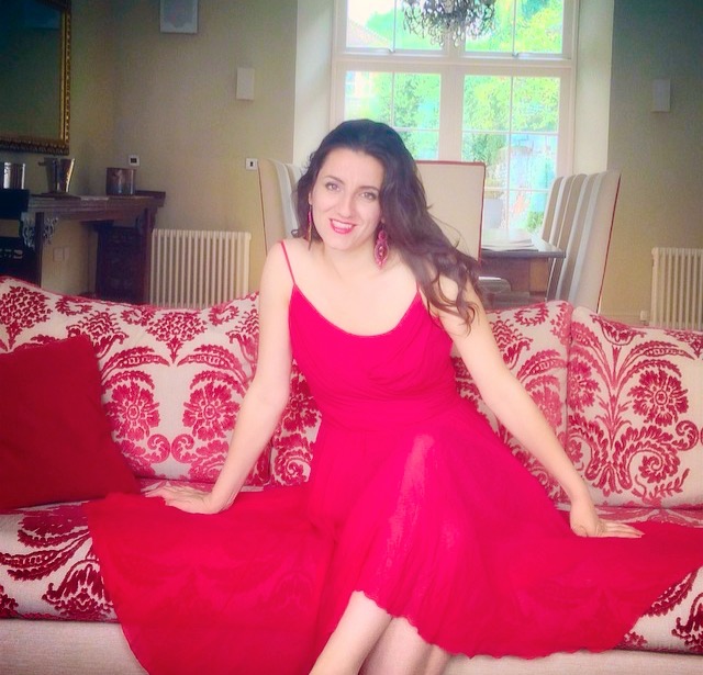 Claudia in a red dress